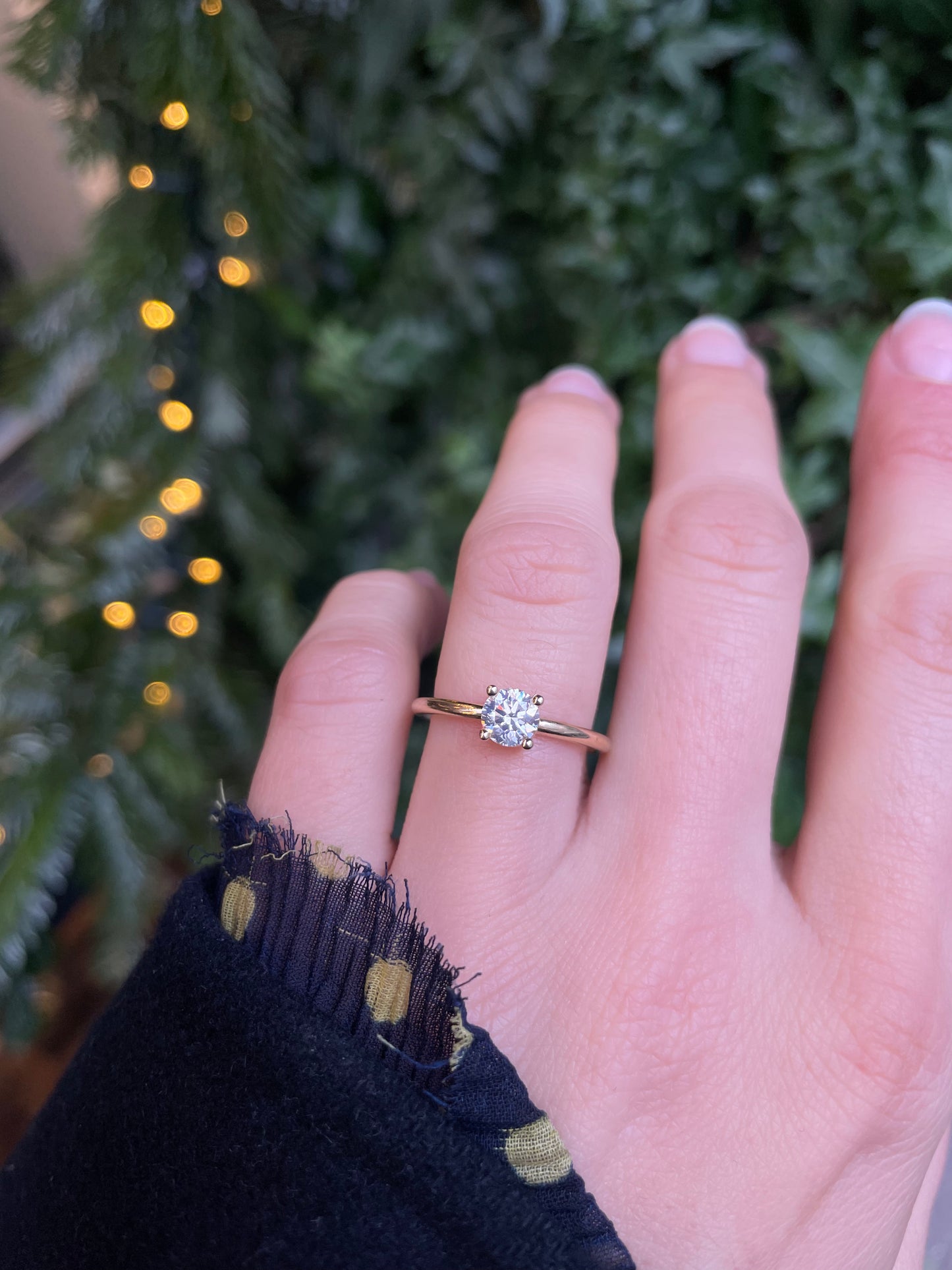 A gold ring with a 0.50Ct Diamond Wesselton , in a clear color. It is set in a 4 prong setting.