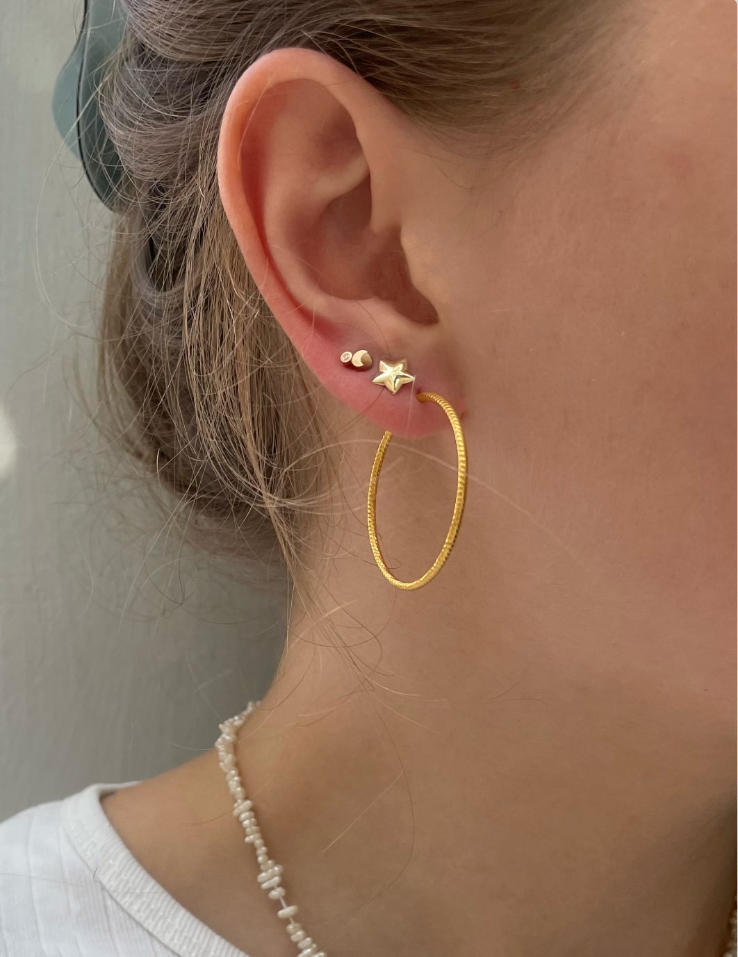 Petit Star (Sold as single) Earring-Gold   14 Karat